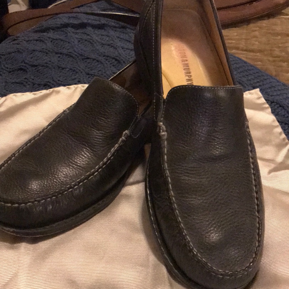 Black leather loafers